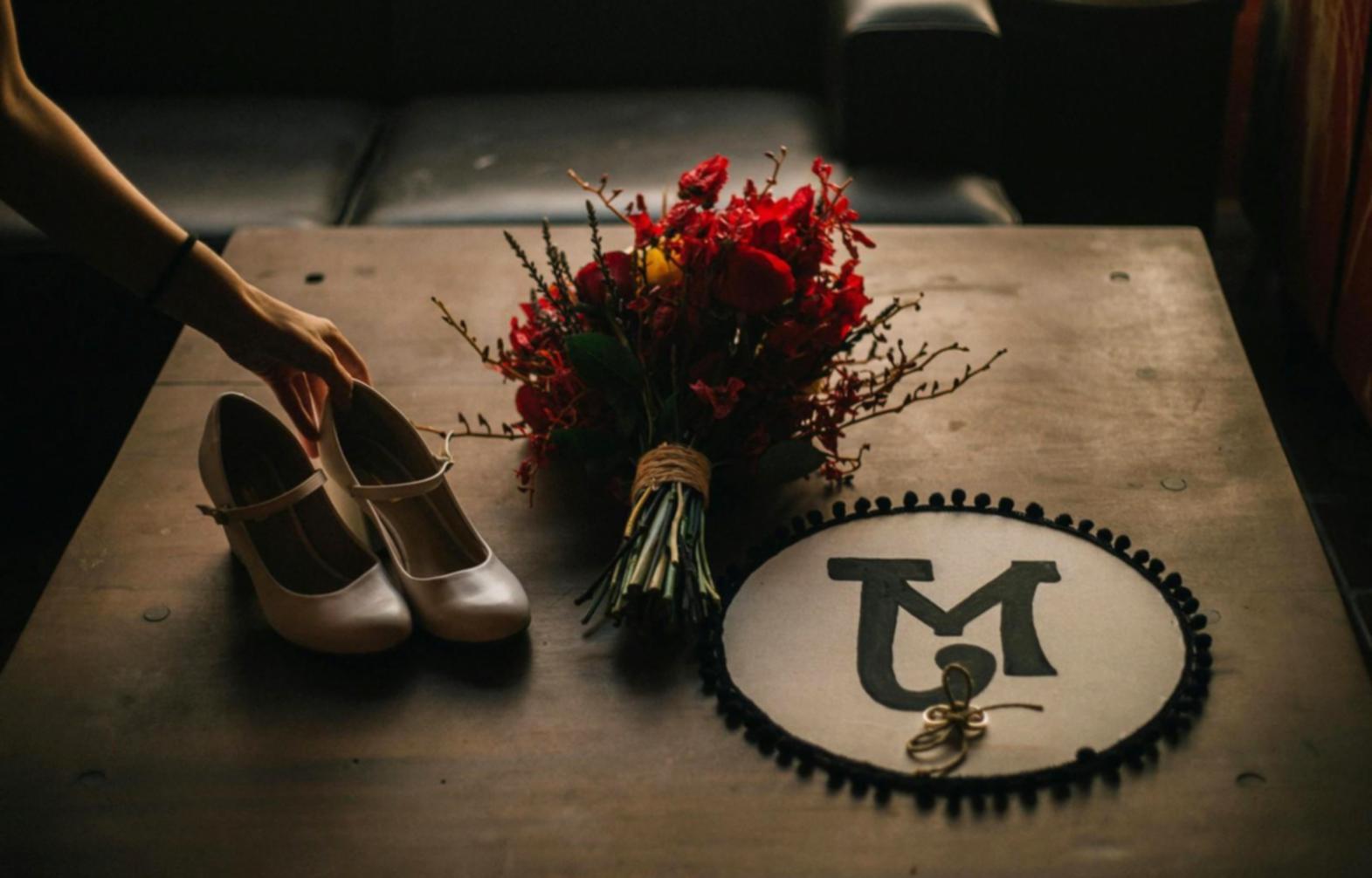 Game development workspace with multiple monitors showing code and 3D models